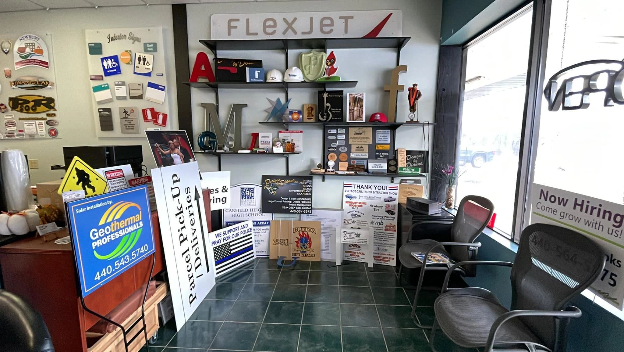 Flexjet and Geothermal Professionals interior signage display studio